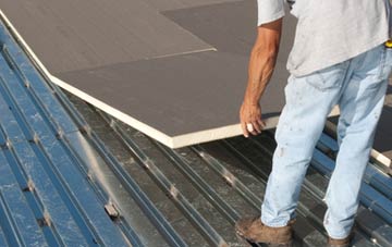 benefits of insulating Barnack flat roofing
